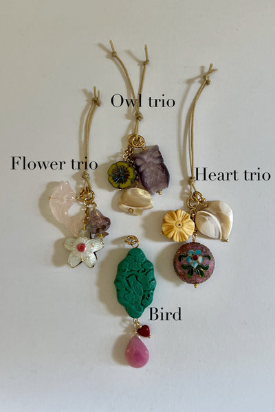 Charm trios